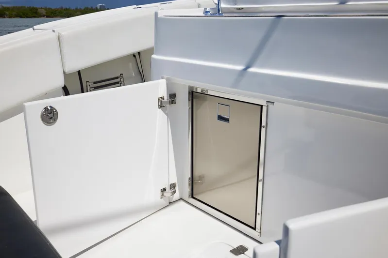  Yacht Photos Pics 2016 Midnight Express 43' Open boat storage compartment with open hatch.