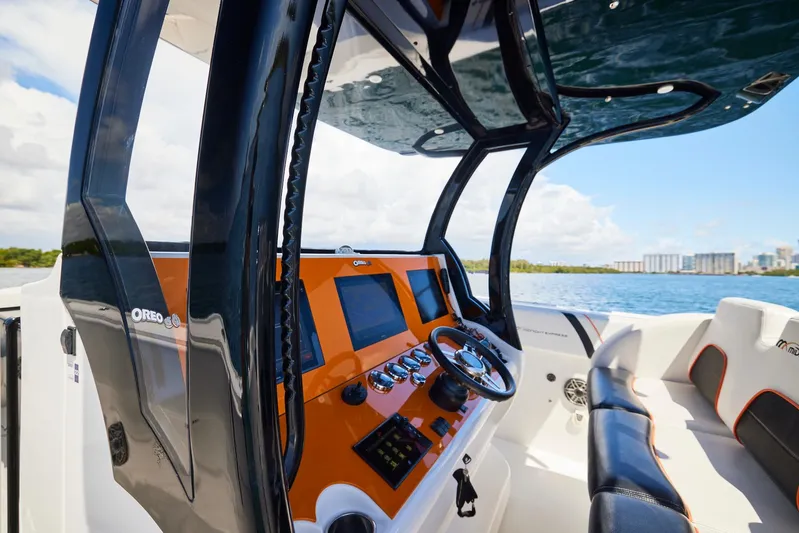  Yacht Photos Pics 2016 Midnight Express 43' Open boat interior with modern dashboard and steering wheel.