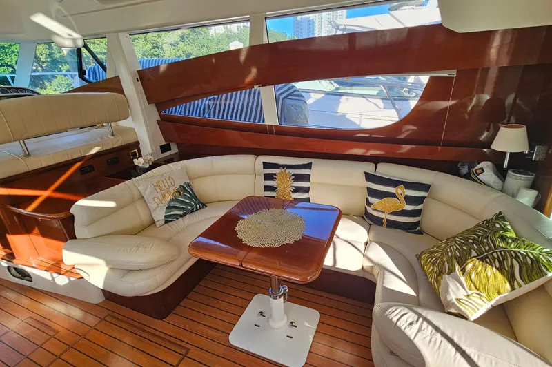Kopara Yacht Photos Pics Luxurious 2005 Prestige 46 yacht interior with elegant seating and decorative pillows.