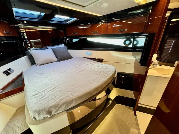 Grey Yacht Photos Pics Luxurious cabin interior of 2021 Riva 56 Rivale yacht with elegant wood finishes.