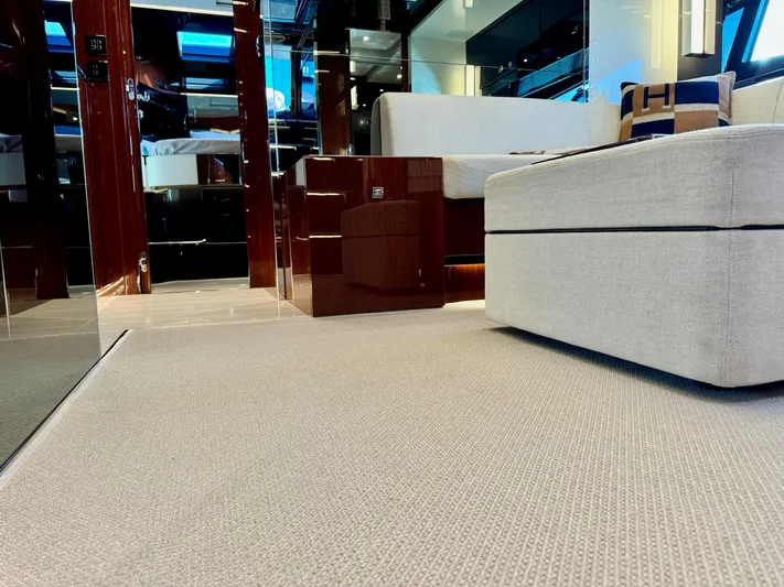 Grey Yacht Photos Pics Luxurious interior of 2021 Riva 56 Rivale yacht with modern furnishings and elegant design.