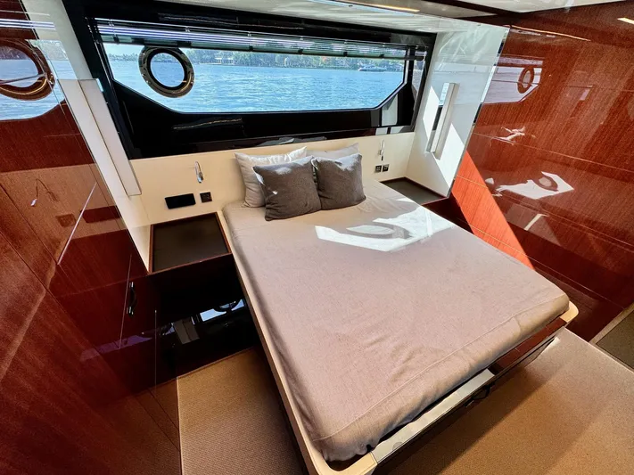 Grey Yacht Photos Pics Luxurious bedroom interior of 2021 Riva 56 Rivale yacht with elegant wood finishes.