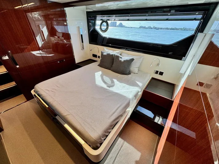 Grey Yacht Photos Pics Luxurious bedroom interior of 2021 Riva 56 Rivale yacht with ocean view.