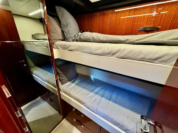 Grey Yacht Photos Pics Bunk beds in 2021 Riva 56 RIVALE yacht cabin with wooden interior.
