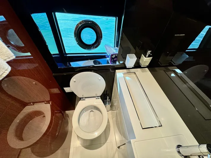 Grey Yacht Photos Pics Luxury bathroom on 2021 Riva 56 Rivale yacht with ocean view.