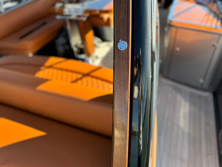 Grey Yacht Photos Pics Luxurious interior of 2021 Riva 56 Rivale yacht with sleek wood and leather details.