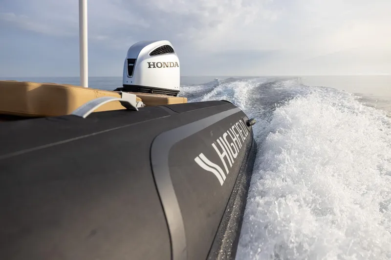  Yacht Photos Pics Highfield Sport 800 boat with Honda engine cruising on open water, 2026 model.