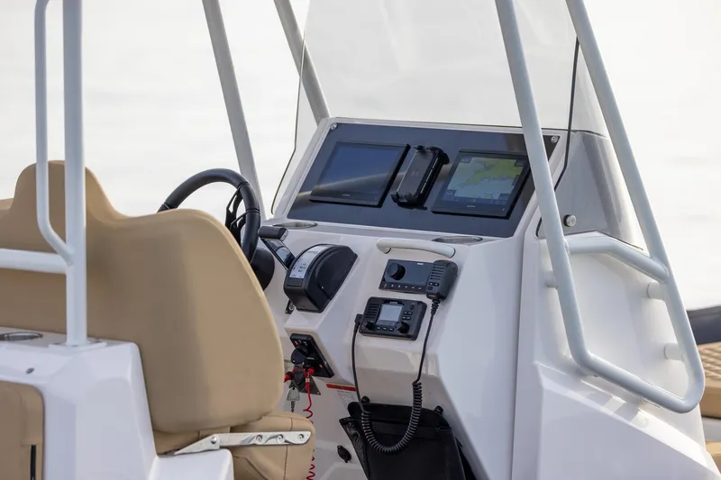  Yacht Photos Pics 2026 Highfield Sport 800 boat dashboard with navigation screens and controls.