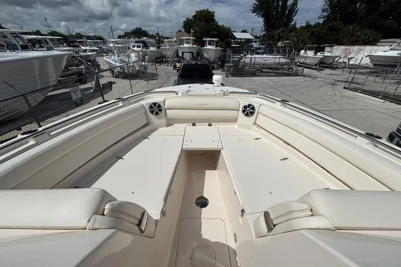  Yacht Photos Pics 2018 Grady-White Freedom 325 boat interior with spacious seating and storage.