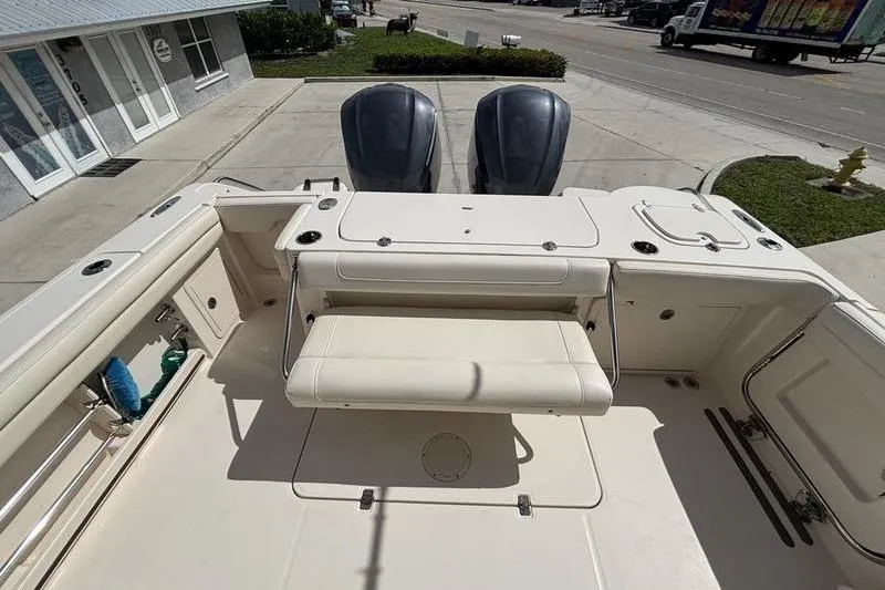  Yacht Photos Pics 2018 Grady-White Freedom 325 boat with dual engines and spacious seating area.