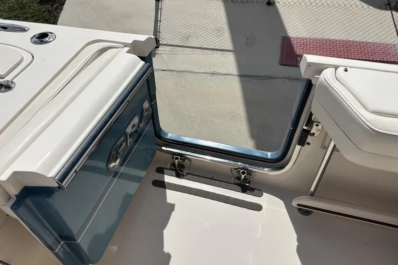  Yacht Photos Pics 2018 Grady-White Freedom 325 boat interior with open transom door.