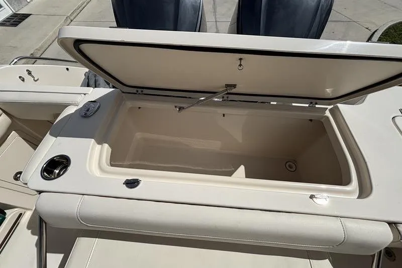  Yacht Photos Pics Open storage compartment on 2018 Grady-White Freedom 325 boat, showcasing interior space.