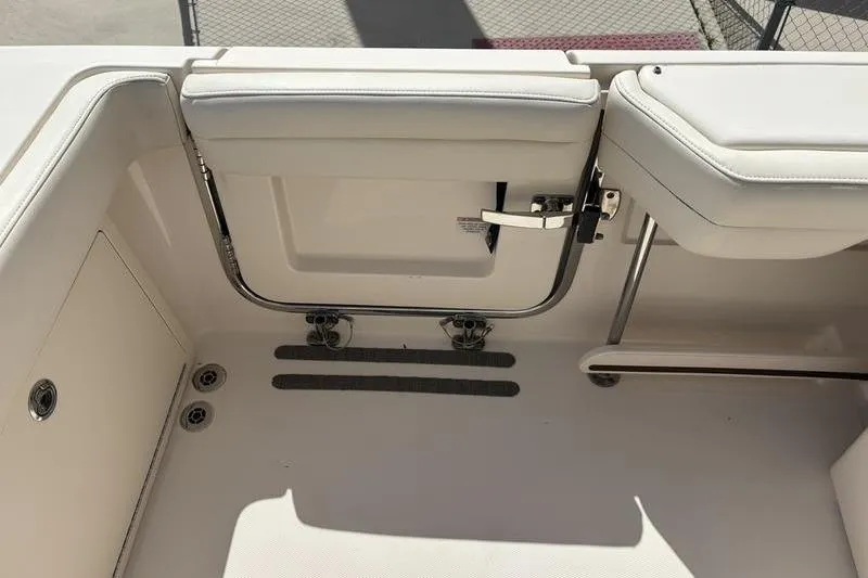  Yacht Photos Pics 2018 Grady-White Freedom 325 boat interior with white seating and stainless steel fittings.