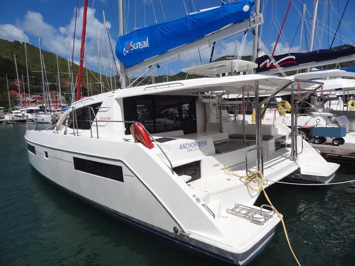 Anchor Beer Yacht Photos Pics 2020 Leopard 40 catamaran docked in marina, featuring Sunsail branding and spacious deck.