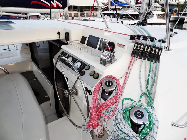 Anchor Beer Yacht Photos Pics Cockpit of 2020 Leopard 40 catamaran with steering wheel and colorful ropes.