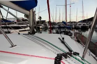 Leopard 40 catamaran docked in marina, surrounded by sailboats, 2020 model.