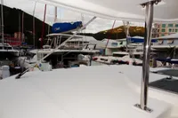 Docked Leopard 40 catamaran, 2020 model, surrounded by other boats in a marina setting.