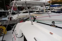 2020 Leopard 40 catamaran docked at marina, featuring sleek design and modern rigging.