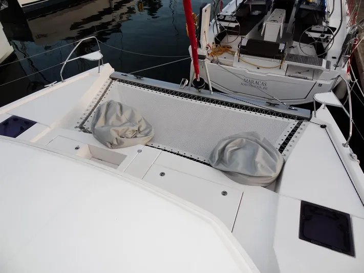 Anchor Beer Yacht Photos Pics Catamaran deck with netting and bean bags, Leopard 40, 2020 model, docked at marina.