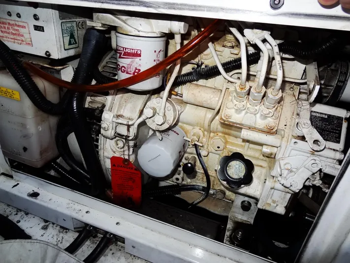 Anchor Beer Yacht Photos Pics Engine compartment of a 2020 Leopard 40, showcasing mechanical components and wiring.