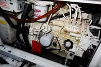 Engine compartment of a 2020 Leopard 40, showcasing mechanical components and wiring.