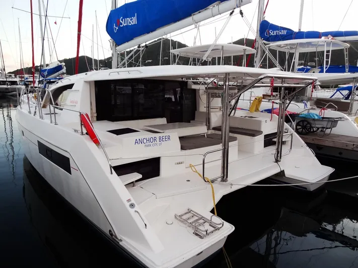 Anchor Beer Yacht Photos Pics 2020 Leopard 40 catamaran docked, featuring spacious deck and SunSail branding.
