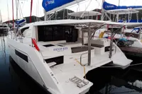 2020 Leopard 40 catamaran docked, featuring spacious deck and SunSail branding.