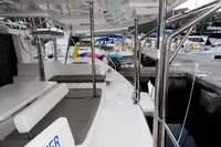 2020 Leopard 40 catamaran docked, featuring spacious seating and sleek design.