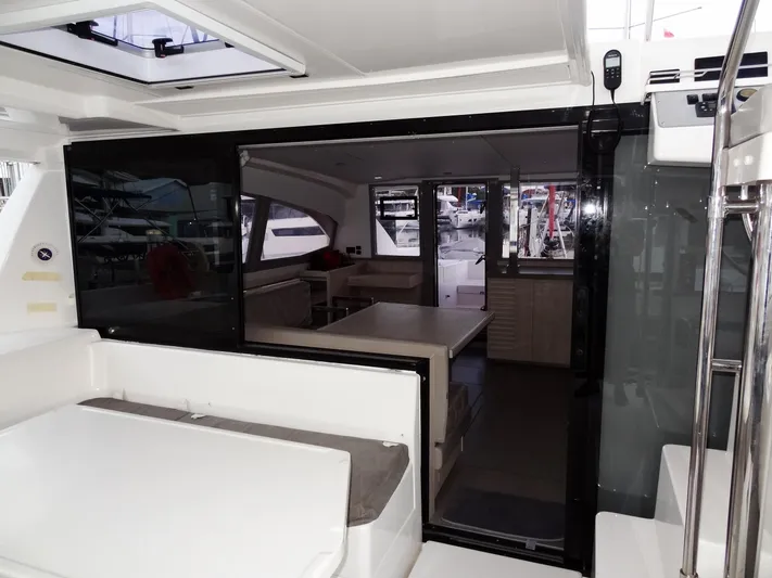 Anchor Beer Yacht Photos Pics Interior view of a 2020 Leopard 40 catamaran, showcasing modern seating and dining area.