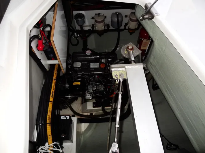 Anchor Beer Yacht Photos Pics Engine compartment of a 2020 Leopard 40 catamaran, showcasing mechanical components and wiring.