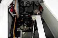 Engine compartment of a 2020 Leopard 40 catamaran, showcasing mechanical components and wiring.