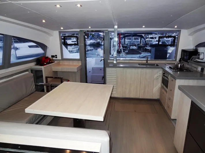 Anchor Beer Yacht Photos Pics Interior of 2020 Leopard 40 catamaran with modern kitchen and dining area.