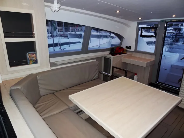 Anchor Beer Yacht Photos Pics Modern interior of 2020 Leopard 40 catamaran with dining area and large windows.