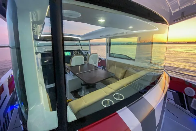  Yacht Photos Pics Interior of 2021 Axopar 37 XC Cross Cabin at sunset.