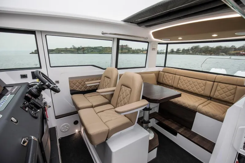  Yacht Photos Pics Interior of 2021 Axopar 37 XC Cross Cabin with luxurious seating.