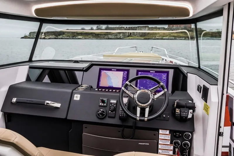  Yacht Photos Pics Interior view of 2021 Axopar 37 XC Cross Cabin cockpit.