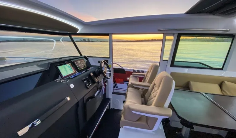 Yacht Photos Pics Interior of 2021 Axopar 37 XC Cross Cabin at sunset.