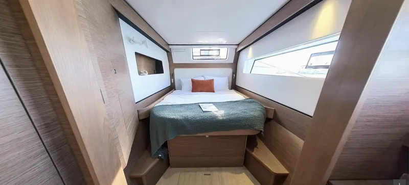 Good Wibe Yacht Photos Pics Luxurious cabin interior of 2024 Nautitech 48 Open yacht with modern design.