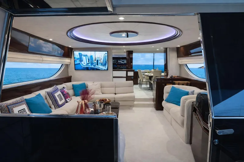 Hasard Yacht Photos Pics Luxurious interior of a 2002 Ferretti Yachts 720 with ocean view and modern decor.