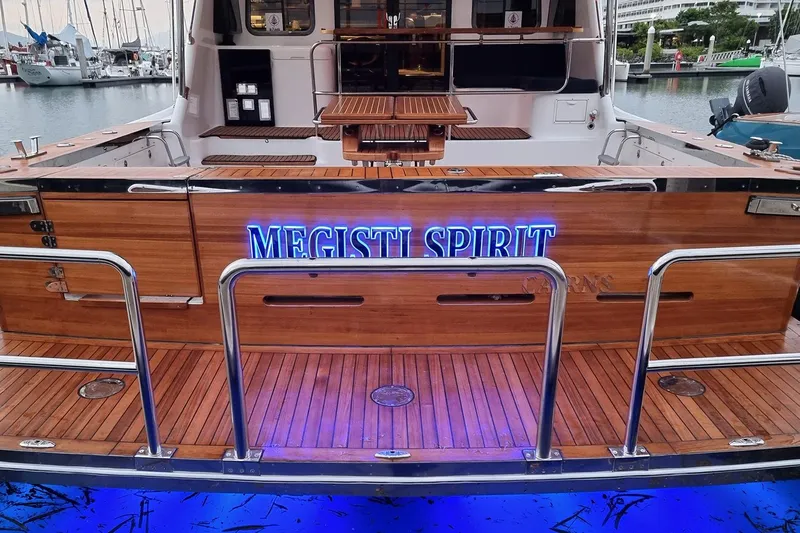 Megisti Spirit Yacht Photos Pics 2008 Westcoaster 70 Flybridge Cruiser with "Megisti Spirit" name, docked at marina.