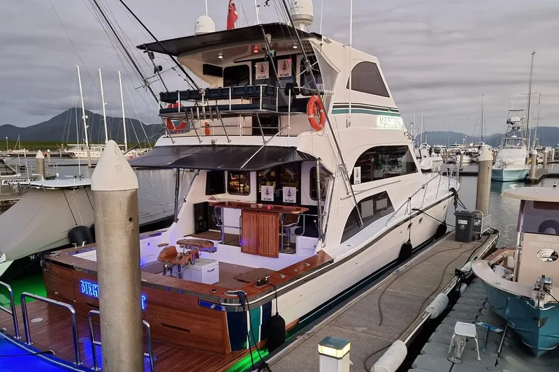 Megisti Spirit Yacht Photos Pics 2008 Westcoaster 70 Flybridge Cruiser docked at marina, showcasing elegant design and spacious deck.
