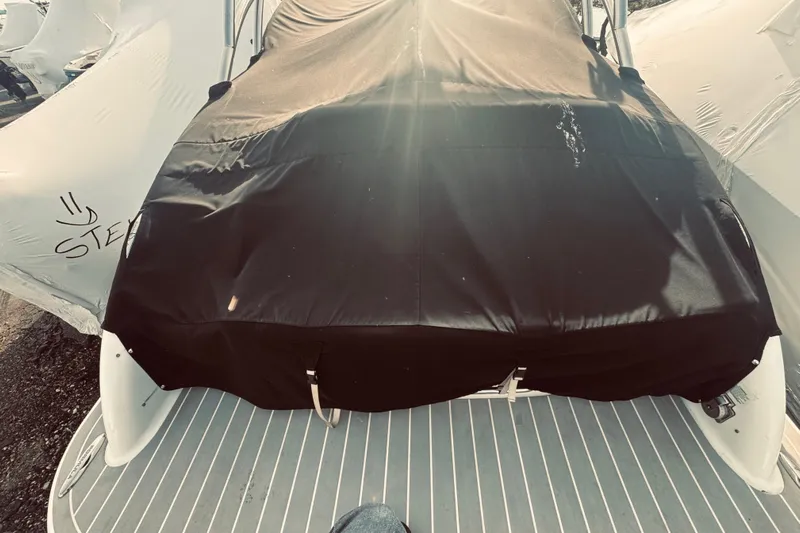  Yacht Photos Pics 2019 Formula 310 FX Bowrider covered, docked with protective tarp.