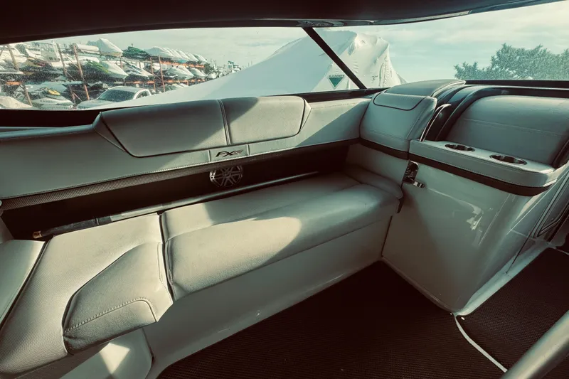  Yacht Photos Pics Luxurious interior of 2019 Formula 310 FX Bowrider with plush seating and cup holders.