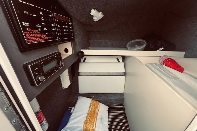  Yacht Photos Pics Interior cabin of 2019 Formula 310 FX Bowrider with control panels and seating.