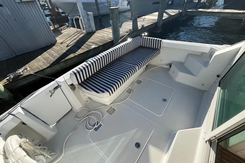 Galene Yacht Photos Pics 2010 Back Cove 33 Express Hardtop boat with striped seating at dock.