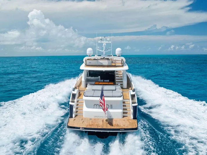 Mojo II Yacht Photos Pics 2009 Princess Motor Yacht cruising on open ocean with clear skies.