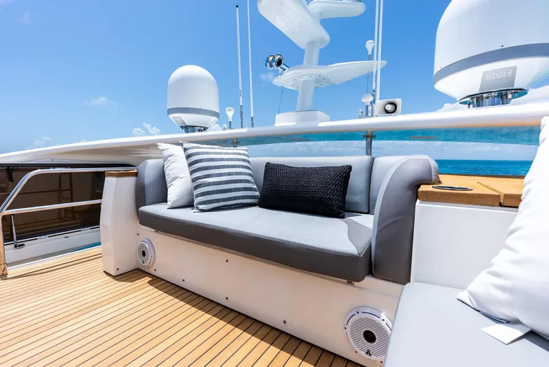 Mojo II Yacht Photos Pics Luxurious 2009 Princess Motor Yacht deck with stylish seating and ocean view.