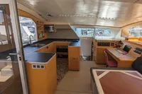 Interior of 2015 Flash Cat 52S yacht with modern kitchen and navigation area.