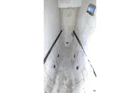 Interior view of 2015 Flash Cat 52S boat hull, featuring a narrow, white compartment.