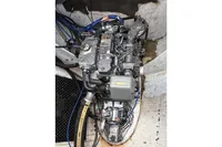 Engine compartment of a 2015 Flash Cat 52S boat, showing detailed mechanical components.